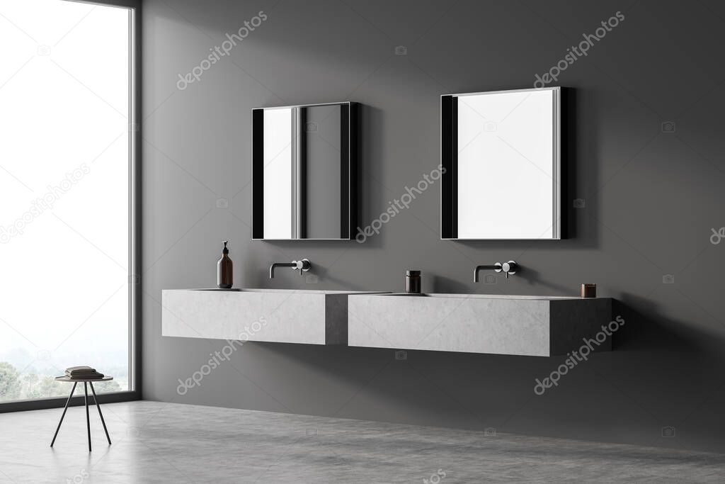 Panoramic grey bathroom interior with shelf vanities, concrete floor, two square mirrors and minimalist stool with towel. Concept of modern hotel design. Corner view. 3d rendering