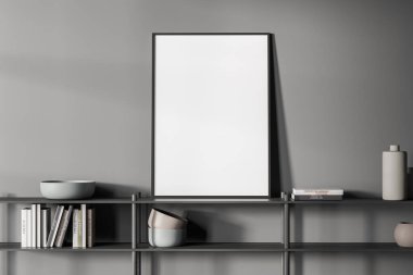 Boş tuval, gri oturma odasındaki en alt rafın üstünde duruyor. İç tasarımda modern trend kavramı. Model yap. 3d oluşturma