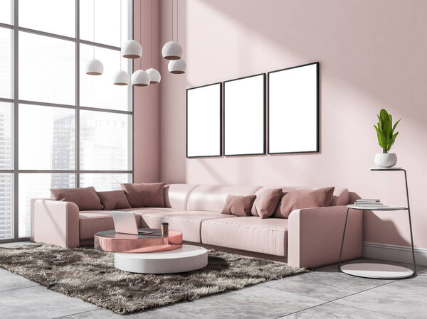 Relaxing room interior with pink corner sofa and coffee table with laptop, panoramic window with city view, lamps and plant on tiled floor. Three blank copy space frames in row, 3D rendering