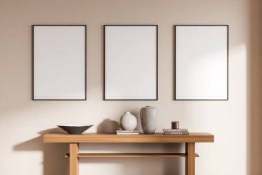 Üst üste üç boş beyaz poster sergi, çanak çömlek, kitaplar, masa, şeftali rengi duvar. Sanat yeri için minimalist tasarım kavramı. Model yap. 3d oluşturma
