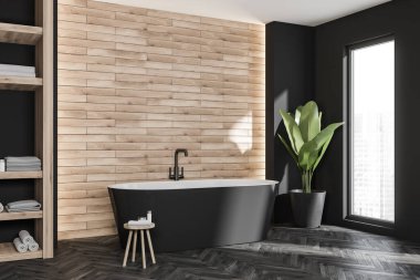 Modern banyo içinin köşesinde ovalar siyah küvetin yanında fayanslı duvarlar ve moda taburesi var. Parke tarzı zemin. Ev ve otel tasarımı kavramı. 3d oluşturma