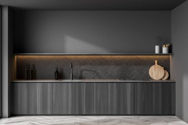 Açık raflı koyu gri mutfak, aksan aydınlatma, parke tarzı geri sıçrama, boş duvar, beton zemin ve ahşap dolaplar. Modern minimalist tasarım konsepti. 3d oluşturma