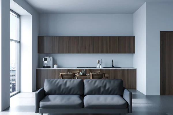 Interior Cozinha Minimalista Com Sofá Preto Piso Concreto Cadeiras Mesa — Fotografia de Stock