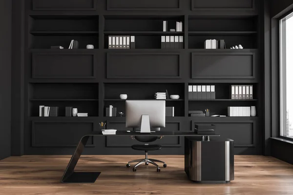 Luxury top manager office interior with original office desk, stylish black shelves and wooden floor. Concept of modern design. 3d rendering