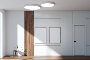 Apartmanın içinde ahşap zemin ve bitki ve dekorasyonlu kahve masası var. Duvarda iki adet resim kopyası çerçevesi, 3B görüntüleme