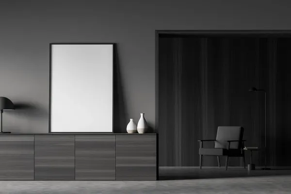 Empty canvas standing on sideboard in living room interior with minimalist concept. Single armchair on dark background. Mock up. Design in grey. 3d rendering