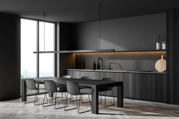 Corner view of dark grey kitchen with on trend details, open shelf, accent illumination, parquet style backsplash, dining table with six chairs and wood floor. Minimalist design concept. 3d rendering