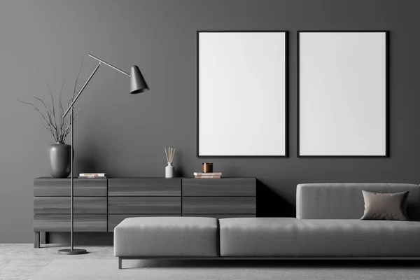 Living room with two canvases, sideboard, on trend lamp, sofa and concrete floor. Modern interior design in grey. Minimalist concept. Mock up. 3d rendering