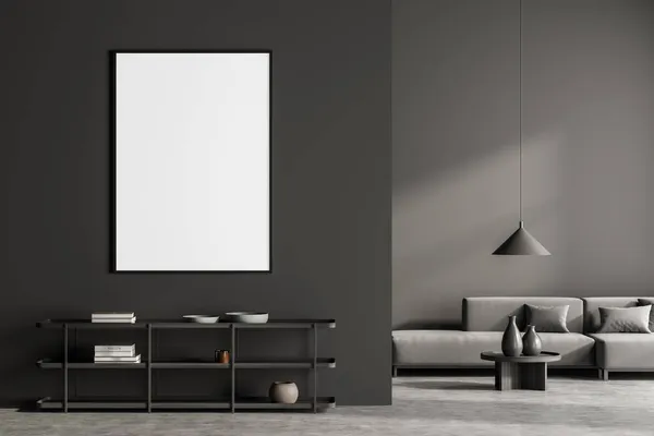 Dark living room interior with empty white poster, sofa, shelves, coffee table, crockery, carpet and concrete floor. Concept of minimalist design. Comfortable place for meeting. Mock up. 3d rendering