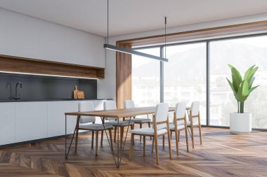 Panoramik beyaz mutfak, yemek masası, doğrusal ışık, loggia, parke döşeme ve gri kapaklı minimalist modüler dolap. Modern iç tasarım kavramı. Köşe manzarası. 3d oluşturma