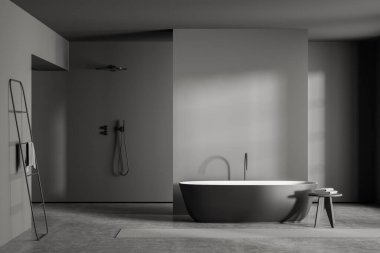 Minimalist tasarımı olan modern gri banyo, açık konsept duş, oval seramik küvet, boş duvar ve beton döşeme. 3d oluşturma