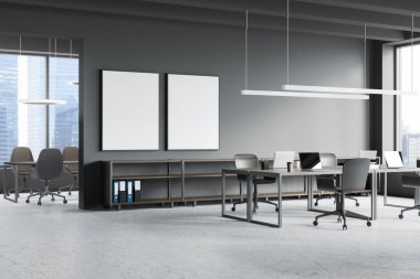 Gri açık uzay ofisinin iç tarafında, arka planda beton zemin ve toplantı odası olan iki adet model çerçeve. Modern tasarımın 3d yorumlama kavramı.