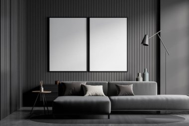 İçi gri kanepe ve lambayla dolu dinlenme odası, kamış ayırıcılı kahve masası, arka planda tuvalet, gri beton zemin ve halı. Sıraya dizilmiş iki boş tuval, 3 boyutlu görüntüleme