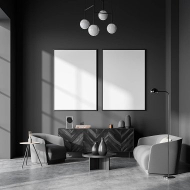 Koltukları ve lambası olan dinlenme odası kitaplar ve dekorasyonlu siyah ahşap tuvalet gri beton zemin. Duvardaki iki boş tuval, üç boyutlu.