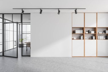 Parlak ofis odası içi boş beyaz duvar, masa, koltuk, kitaplarla dolu raf ve beton zemin. Çalışma süreci için mükemmel bir yer. Minimalist tasarım. Model yap. 3d oluşturma