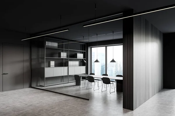 Dark meeting room interior with black seats and shelf with business documents, table on grey concrete floor, side view. Panoramic window with city view on Singapore. 3D rendering