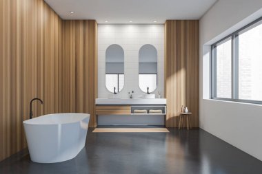 Minimalist banyo içi, aynalı iki lavabo, banyo aksesuarları ve havluları olan raf ve masa beton zeminde beyaz küvet, şehir manzaralı pencere. 3B görüntüleme