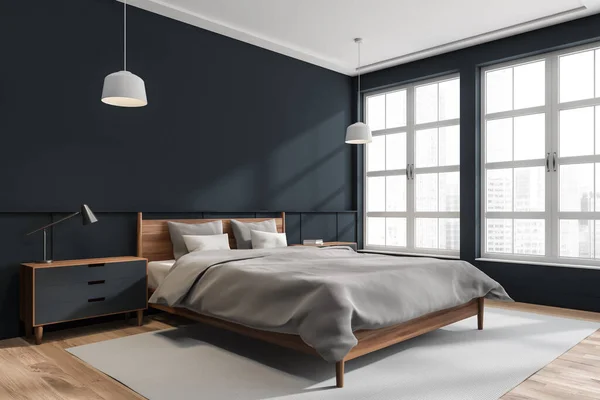 市街地ビュー 木製ベッド ペンダントランプ ベッドサイドテーブル ラグと寄木細工の床と濃い青とグレーの寝室のインテリアのコーナー 現代的なデザインの概念 3Dレンダリング — ストック写真
