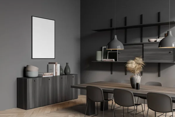 Dark dining room interior with empty white poster, six chair, table, lamp, shelves, sideboard, carpet and oak wooden parquet floor. Concept of minimalist design for eating place. Mock up. 3d rendering