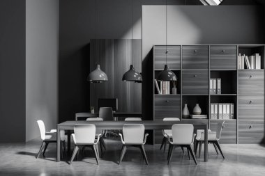 İki masaüstü, rahat koltuklar, masalar ve beton zemin olan karanlık ofis odasının önü. Çalışma süreci için mükemmel bir yer. Minimalist tasarım. 3d oluşturma