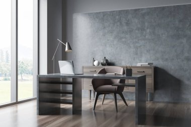 Panorama Gri CEO ofis iç tasarımı kişisel masa, koltuk ve büfe beton duvar ve ahşap döşeme yanında. Taşrada çalışma alanı kavramı. 3d oluşturma