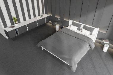 Karanlık yatak odası manzarası, çarşaf ve yastıklı yatak dekorasyonu ve bitkisi olan klozet. Beton zeminde kitapları olan bir komodin. 3B görüntüleme