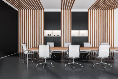 Dikdörtgen masa, ofis sandalyeleri, raflar, dekoratif ahşap paneller ve beton zemin olan zarif koyu gri konferans salonu. Modern tasarım kavramı. 3d oluşturma