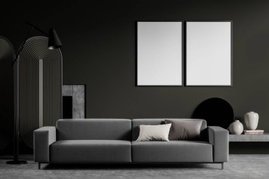 Koyu kahverengi oturma odasındaki iki boş tuval, gri kanepe ve beton zeminli iç tasarım. Modern minimalist konsept. 3d oluşturma