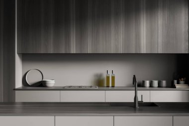 Karanlık mutfak içini lavabo, gaz ocağı, yağ şişeleri, tabaklar, çanak çömlek, dolaplar, kaşıklar, havlular ile kapatın. Minimalist tasarım kavramı. Yaratıcı fikir için yer var. 3d oluşturma