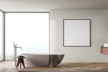 Bej banyonun içinde monte edilmiş mikser, küvet ve ahşap zeminde havlular olan bir masa var. Kırsal kesimde panoramik pencere. Kare branda çerçeve, 3B görüntüleme