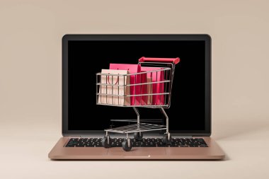 Bej arka planda dizüstü bilgisayar, klavyesinde farklı paketler olan alışveriş arabası. Satış ve alım kavramı. Çevrimiçi sipariş teslimatı. 3B görüntüleme