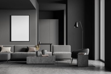 İçinde kanepe ve koltuk olan karanlık, rahatlatıcı bir oda. Sanat süslemeli kahve masası, gri beton zeminde halı. Pencerenin yanında kitap ve lambayla dur. Boş tuval, 3 boyutlu görüntüleme