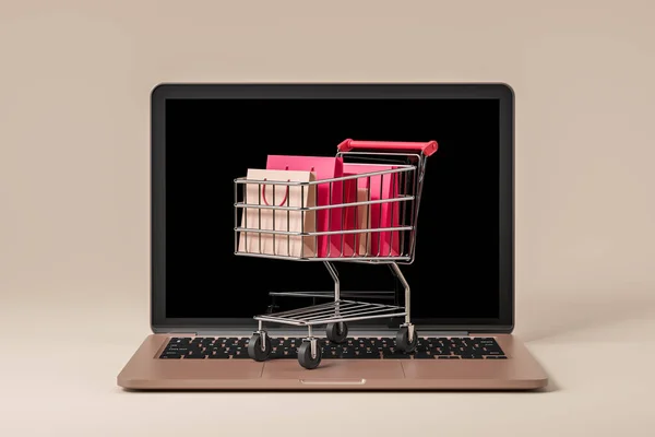 Laptop Auf Beigem Hintergrund Warenkorb Mit Verschiedenen Paketen Auf Der — Stockfoto