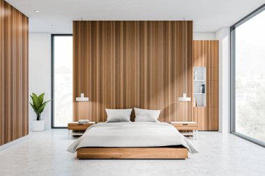 Yatak odasının içi parlak, panoramik pencere şehir manzaralı, beyaz duvarlar, ahşap bölme, beton zemin, kitaplar ve başucu. Çağdaş daire tasarımı kavramı. 3d oluşturma