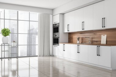 Parlak mutfak odasının iç tarafı panoramik pencereli, perdeli, çift fırınlı, lavabolu, yemek masalı, beton zeminli. Minimalist tasarım kavramı. Yaratıcı fikir için yer var. 3d oluşturma