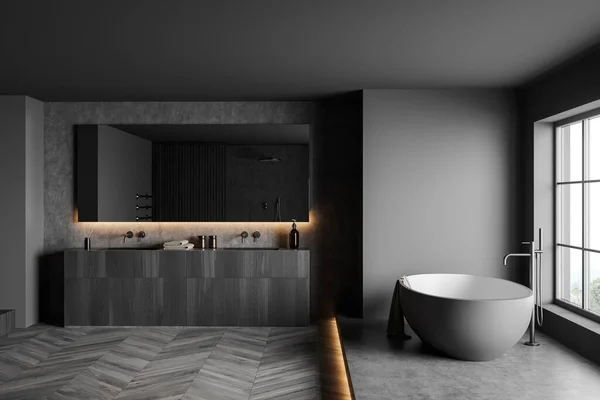 黑暗浴室内部与浴缸在讲台上与背光 两个水池与镜子 灰色硬木地板 全景窗 乡村景色 3D渲染 — 图库照片