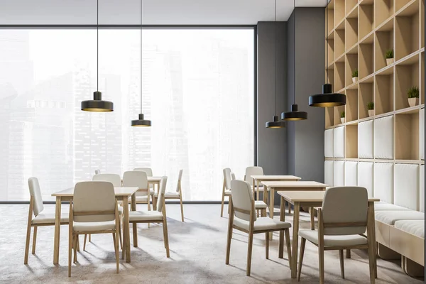 Pandangan Samping Pada Interior Kafe Gelap Dengan Meja Dengan Kursi — Stok Foto
