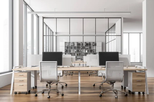 Front view on bright office room interior with desks with desktops, armchairs, panoramic windows, glass partition and wooden floor. Concept of place for working process and coworking. 3d rendering