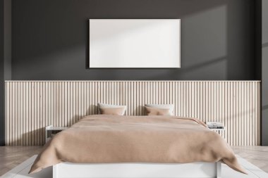 İçerisi karanlık yatak odası, bej çarşaflı ve yastıklı yatak, yerde halı. Siyah duvara afiş asın. 3B görüntüleme