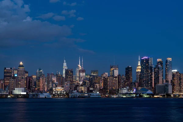 New York city skyscrapers financial downtown and sea panoramic view. Concept of trading and technologies in modern megapolis