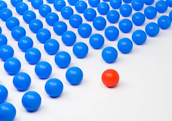 Red leader ball and row of blue balls. Stand out of the crowd. Concept of leadership and uniqueness. 3D rendering
