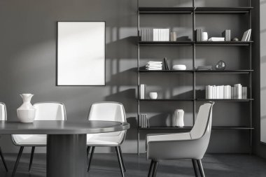 Gri toplantı odası, masa ve koltuklar, kitaplarla dolu raflar ve sanat süslemeleri. Duvardaki çerçeve, koyu beton zemin, 3 boyutlu görüntüleme