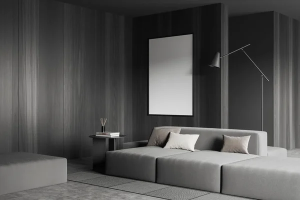 Corner view on dark living room interior with empty white poster, sofa, coffee table and concrete floor. Concept of minimalist design. Space for creative idea. Mock up. 3d rendering