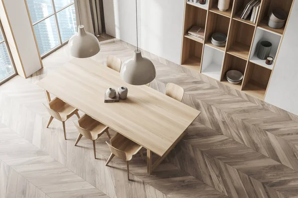 Top view on bright dining room interior with table, chairs, panoramic window, oak wooden hardwood floor, crockery, white walls. Concept of minimalist design. Space for creative idea. 3d rendering