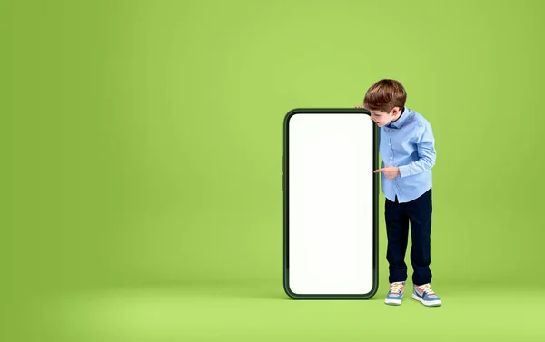 Boy Kid Smiling Finger Point Smartphone Mock Screen Full Length — Stockfoto