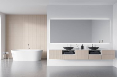 Beyaz otel banyosu, çift lavabo ve arka lambalı ayna, gri beton zeminde küvet. Havlu ve banyo aksesuarlarıyla dolu bir masa. 3B görüntüleme