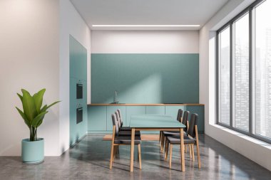 Front view on bright kitchen room interior with dining table with chairs, panoramic window, oven, concrete floor, teal walls, plant. Concept of minimalist design. Space for creative idea. 3d rendering