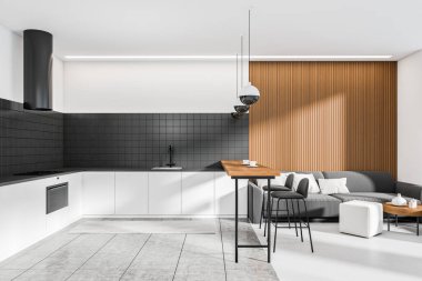White kitchen interior with shelves, hood and sink, bar chairs and dining countertop. Lounge zone with sofa and coffee table with pouf on concrete floor. 3D rendering