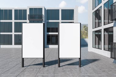 Building exterior and two blank banners mounted on grey tiled floor. Modern hotel and countryside view. Mockup copy space for advertising, 3D rendering