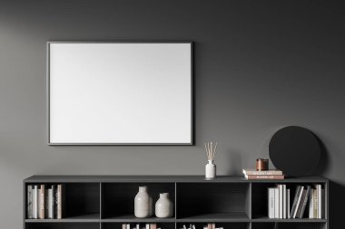 Oturma odasının içinde kostümcü, dekorasyon, kitaplar, vazo ve mum, şık bir sanat alanı var. Gri duvara poster yap. 3B görüntüleme